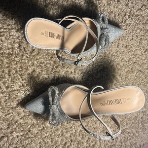 Silver Heels ( not sure the inch of heel ), Worn once, Size 6.